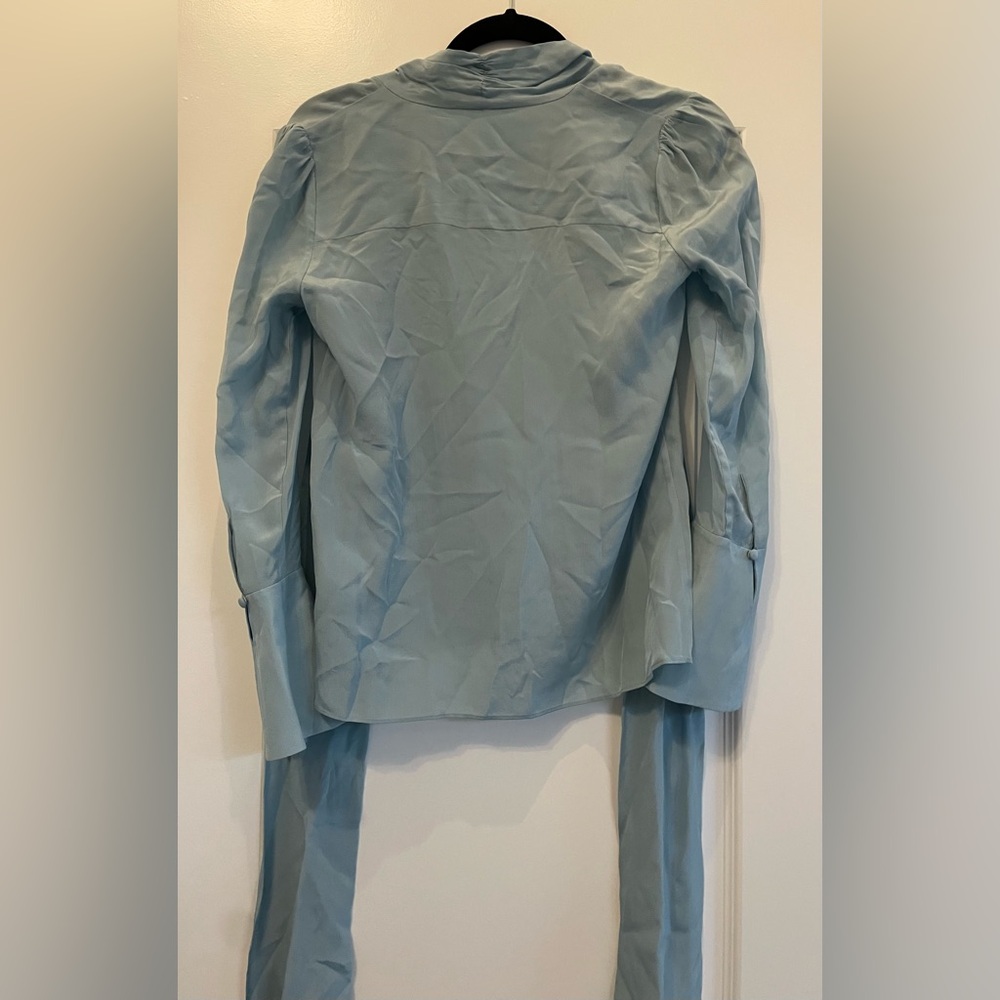 Elegant Light Blue Blouse with Bell Sleeves - Picture 2 of 3